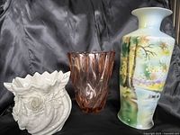 All three vases together showing relative sizes and styles