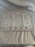 top view showing three removable dishes seated in the tray