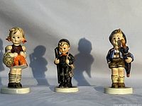 Front view of all three figurines