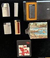 Overview of all lighters, Braun case and two puzzles
