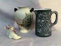 All three items together: scenic vase, jasperware creamer, porcelain boots