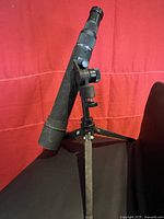 Full view of Tasco telescope mounted on tripod