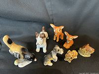 Group shot showing all seven figurines