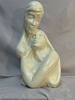 Front view of ceramic lovers statue