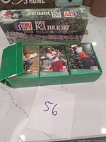 Box of 1991 PGA Tour Set trading cards, showing front side of box with partial view of cards inside