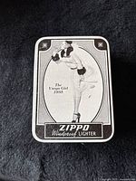 Front of metal Zippo decorative box with The Varga Girl 1935 black and white artwork
