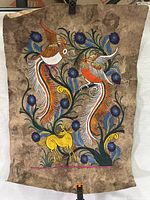 Full view of folk art painting showing two birds, a yellow deer, and floral patterns on brown paper background.