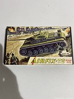 Front of the Vintage Airfix box showing the illustration of a green German assault gun tank in action, with soldiers in the background. Box shows Airfix-72 branding and model identification.