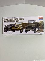Box front showing graphic of the three WWII light vehicles models included: motorcycle, Jeep, Kbelwagen in 1/72 scale by Academy