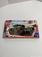 Front of original boxed Airfix Churchill Mk VII tank model kit in 1:72 scale showing packaging artwork and brand.