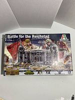 Box front of Italeri 1:72 Battle for the Reichstag model kit showing artwork of the Reichstag building, soldiers, and flags.