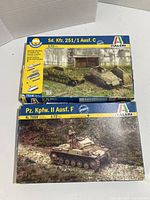 Top view of two Italeri model kit boxes, Sd. Kfz. 251/1 Ausf. C (7516) and Pz. Kpfw. II Ausf. F (7059) in 1/72 scale with military vehicle images on the covers.