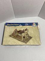 Front of the Italeri Wrecked House 1/72 scale model kit box, showing a color illustration of the completed wrecked house model.