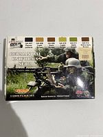 Top view of Lifecolor acrylic paint set box showing color swatches and front artwork with soldiers in combat gear