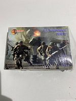 Front of the unopened box showing the US Paratroopers (WW II) set by Mars with a wartime action scene photo.