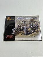 Front of box showing Pegasus branding and artwork of assembled German mortar team figurines in military poses with mortars, titled German Mortar Teams (Granatwerfer)