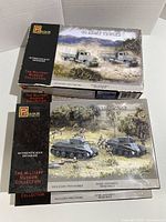 Two sealed box sets of Pegasus Military Museum Collection model kits: one showing US Army Truck, one showing B1-35 Soviet Infantry Tank, both 1/72 scale.