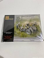Front box art showing the assembled and painted German 75mm le IG18 infantry gun with four infantrymen crew figures, part of the Military Museum Collection by Pegasus Hobbies.