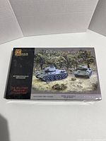 Original box of Pegasus T-34/85 Soviet Tank 1/72 scale model kit showing military diorama artwork and branding.