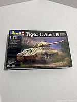 Front of Revell model kit box for Tiger II Ausf. B tank at 1:72 scale with box art showing tank in camo.