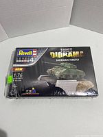 Box front of Revell Sherman Firefly tank model kit showing skill level 4, 1:72 scale and included accessories icons.