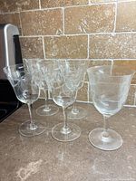 All five Fostoria goblets grouped on countertop
