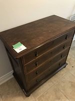 Front and side view of Henredon 4-drawer chest