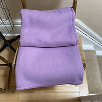 Blanket folded on chair showing color and texture