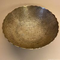 Top view showing interior etching and scalloped rim