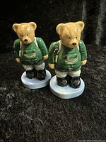 Two Wade Camping Bear ceramic figurines standing side by side showing full figure and base.