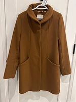 Full front view of coat showing overall silhouette and color