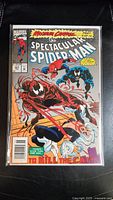 Front cover of The Spectacular Spider-Man comic book issue #201 showing Spider-Man fighting symbiotes Carnage and Venom along with other characters. Cover states Maximum Carnage storyline Part 7 of 14.