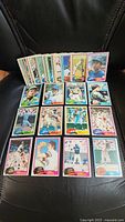 Stack of 50 vintage 1981 O-Pee-Chee baseball cards, some laid out to show front card images.