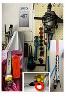 Wide view showing all main tools hanging on pegboard including sander, saws, pole saw, drill, and sanding disks