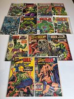 Nine comics arranged in three rows on white background, showing all issue covers