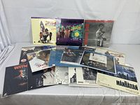 Full collection showing all 15 LaserDisc sleeves of classic movies with varied artwork.