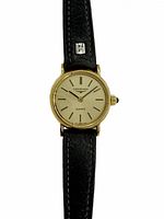 Full length view of Longines wristwatch with gold tone face and black leather strap.