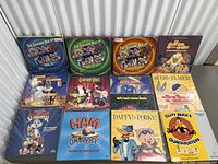 Full overview of all 12 Looney Tunes LaserDiscs in their original album style or jewel cases, showing colorful illustrated covers featuring classic cartoon characters.