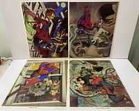 Four Spider-Man prints arranged side by side showing various action scenes and villains.