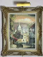 Full view of framed oil painting showing entire artwork and frame with light above.