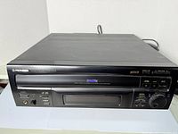 Front view of Pioneer CLD-D702 Laser Disc player showing full unit with branding and controls.