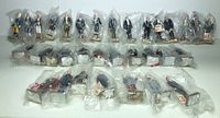 Full set of 35 plastic miniature figures of the first US Presidents in individual plastic bags arrayed in rows