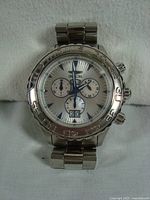 Front view of Invicta Ocean Ghost wristwatch showing silver dial with chronograph subdials and date display.