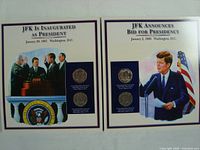 Two commemorative panels displayed side by side, each with two JFK half-dollar coins in protective casing and related historic photos and text.