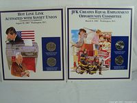 Both JFK commemorative panels side by side showing artwork, two Kennedy half dollars each and descriptive text.