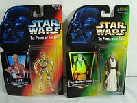 Photo showing two Kenner Star Wars The Power of the Force action figures: C-3PO and Ben (Obi-Wan) Kenobi, both in original sealed packaging.