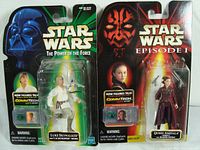 Photo showing both Star Wars CommTech figures in original blister packs: Luke Skywalker from The Power of the Force and Queen Amidala from Episode I.