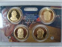 Obverse side of the four proof coins featuring portraits of William Henry Harrison, James K. Polk, Zachary Taylor, and John Tyler in sealed mint packaging with decorative background.