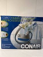 Front view of the Conair compact fabric steamer box showing product image and branding.