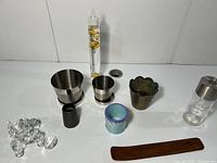 Full view of the lot showing all decorative and desk accessory items arranged on a white surface against a white background.